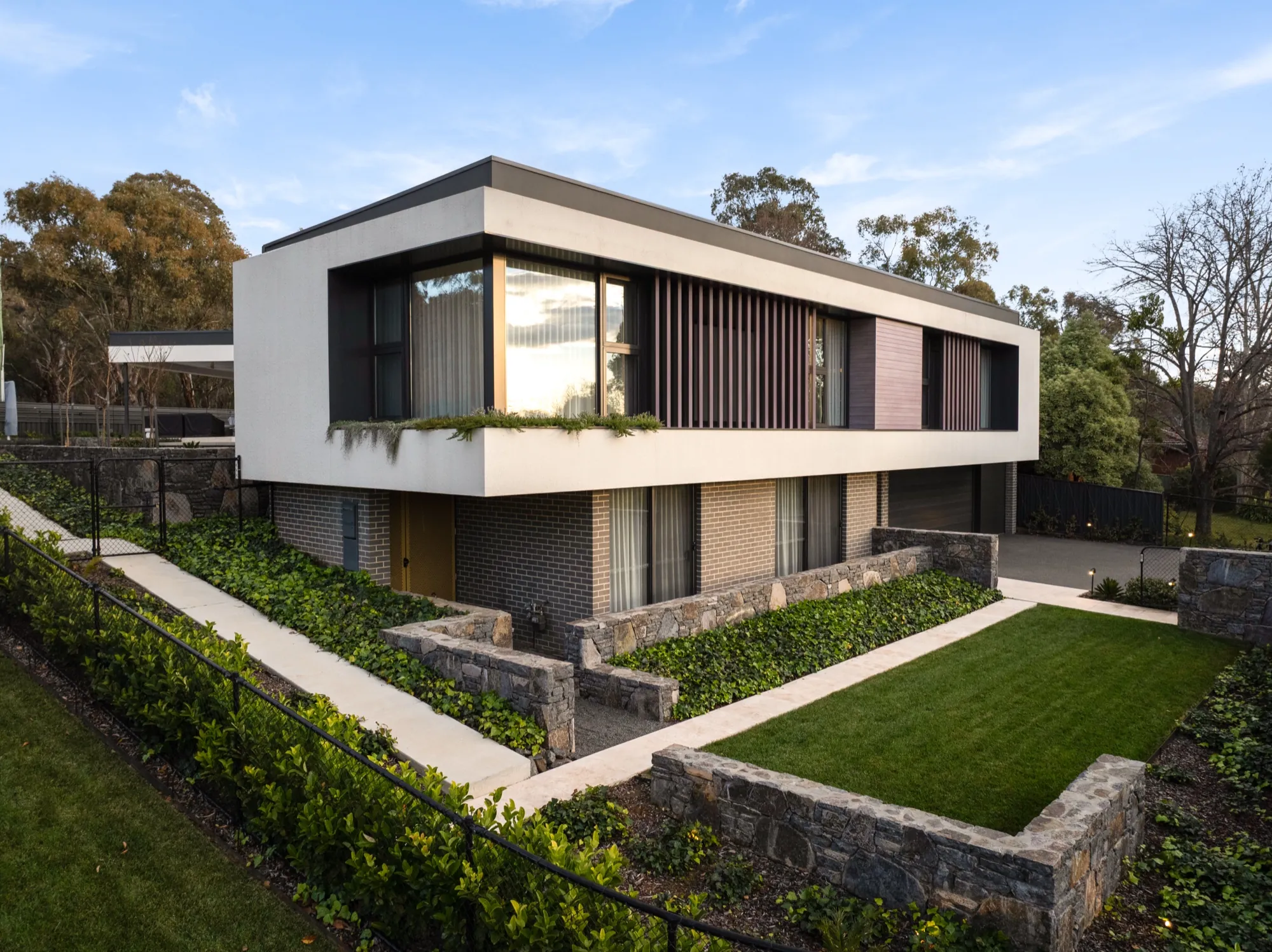 Hackett new build exterior at dusk