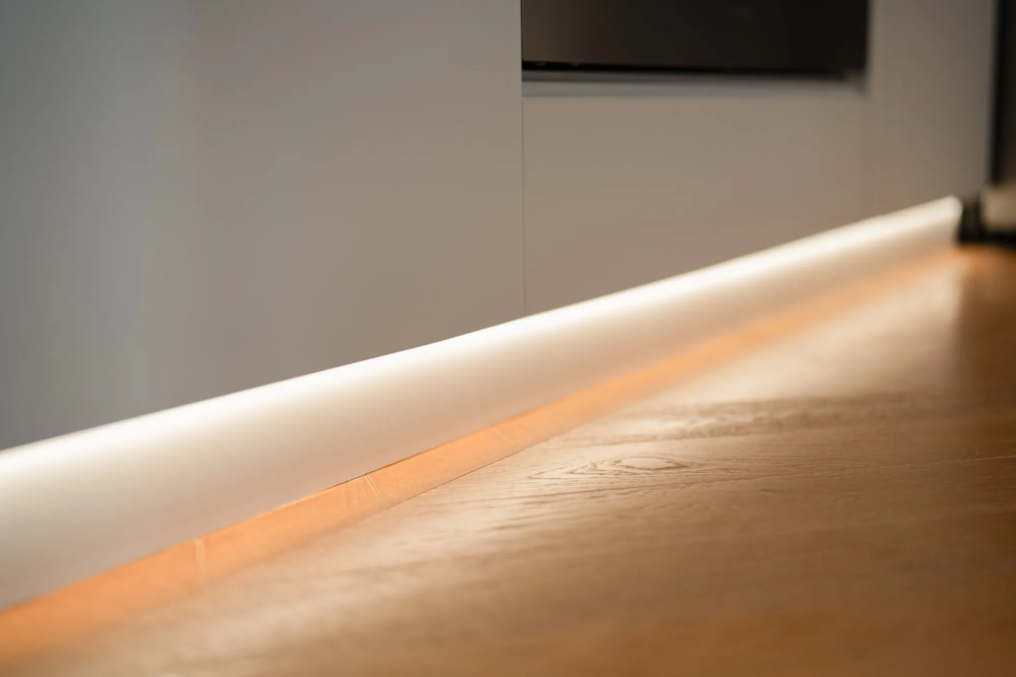 Close-up of LED strip lighting running along the bench edge in the second Phillip apartment